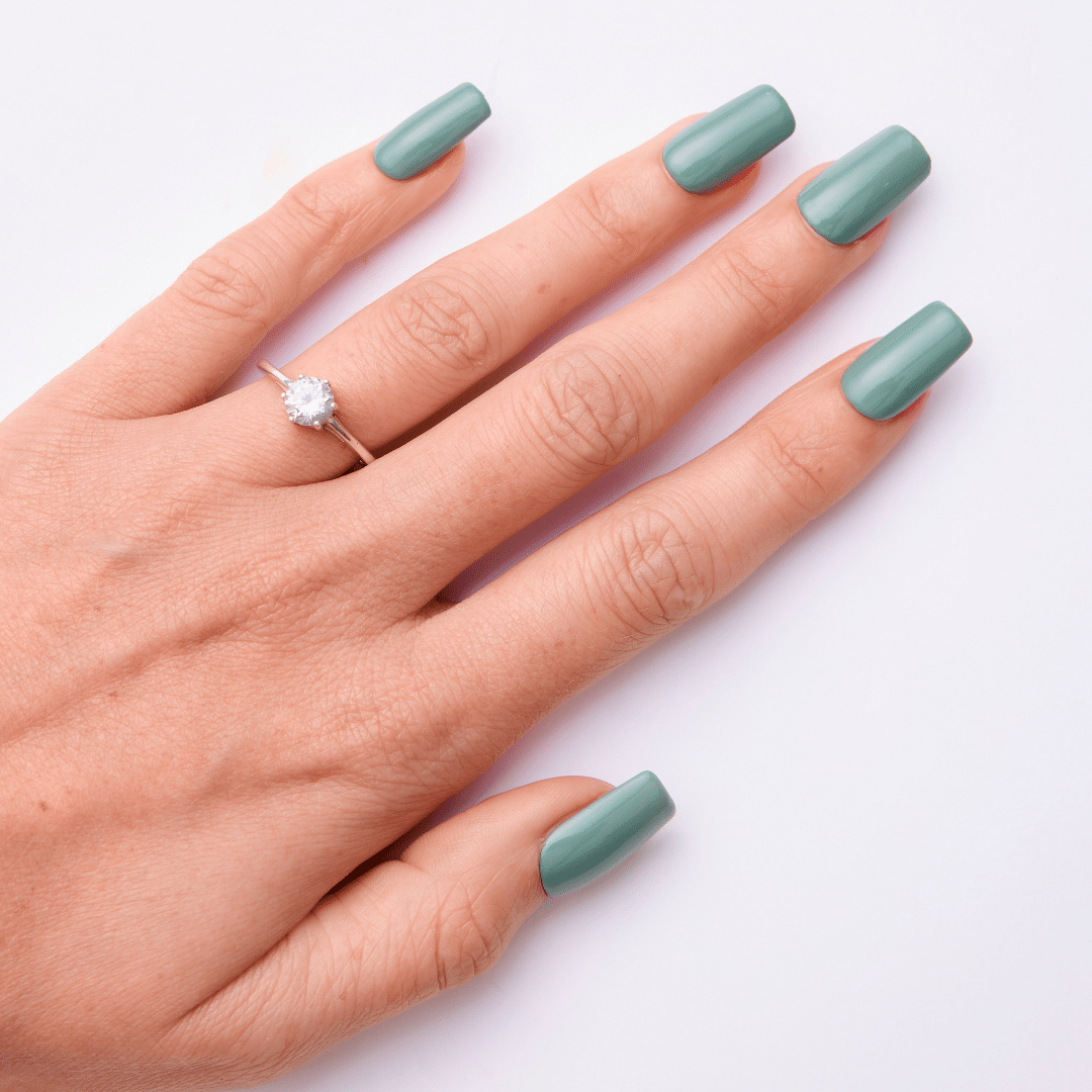 Hand with Green gel polish