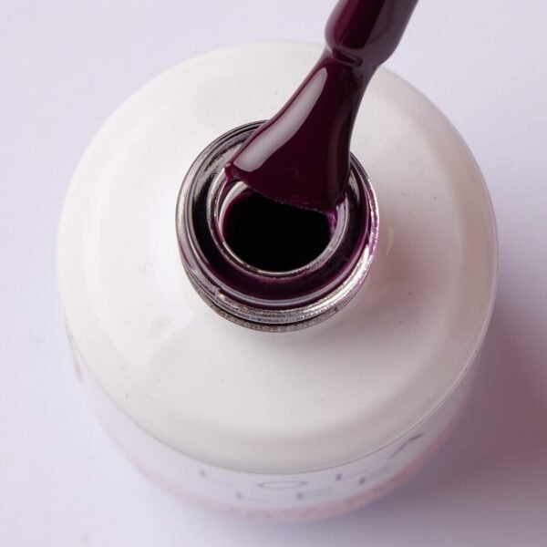 Unleash your inner vixen with 'Lola Lee Me Girl' in radiant purple in a bottle