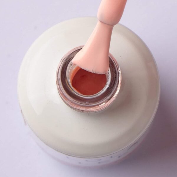 Brush displaying the soft peach pink shade of Can’t Touch My Peach