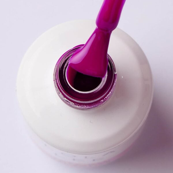 A bottle of Cheers to 'Mixed Drinks About Feelings' Bright Purple Gel Polish by Lola Lee